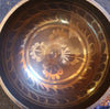 Dharmachakra relief singing bowl