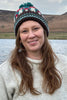 cream hand knitted wool jumper and bobble hat