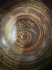 Dharmachakra relief singing bowl