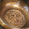 Dharmachakra relief singing bowl