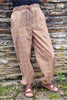 pale orange geo print cotton trousers
