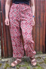 red hand printed cotton trousers
