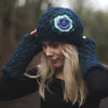 teal cable knit wool beanie hat with large flower