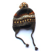 brown ear flap wool bobbl hat with tassels