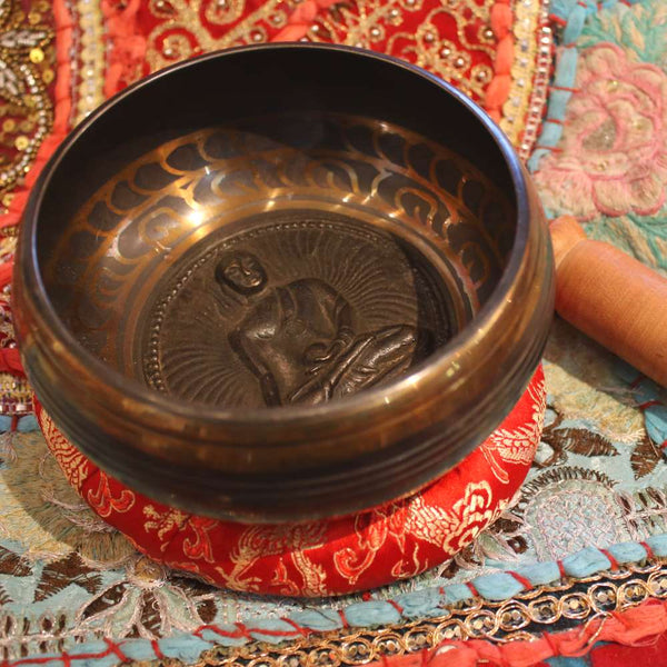 buddha relief singing bowl from Nepal