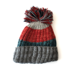 unisex bobble hat with striped pattern in red and blue