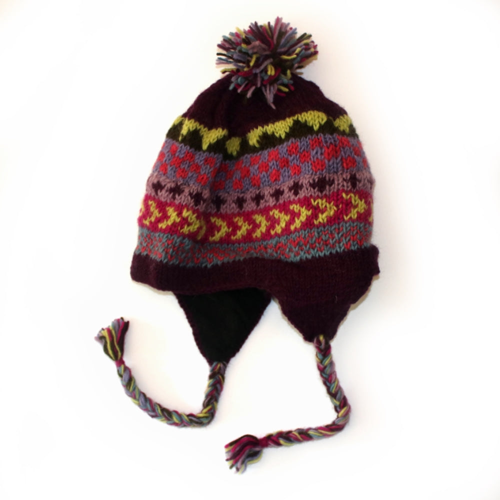 winter stripe bobble hat with purple pattern
