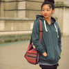 model wears cotton fair trade shoulder bag 